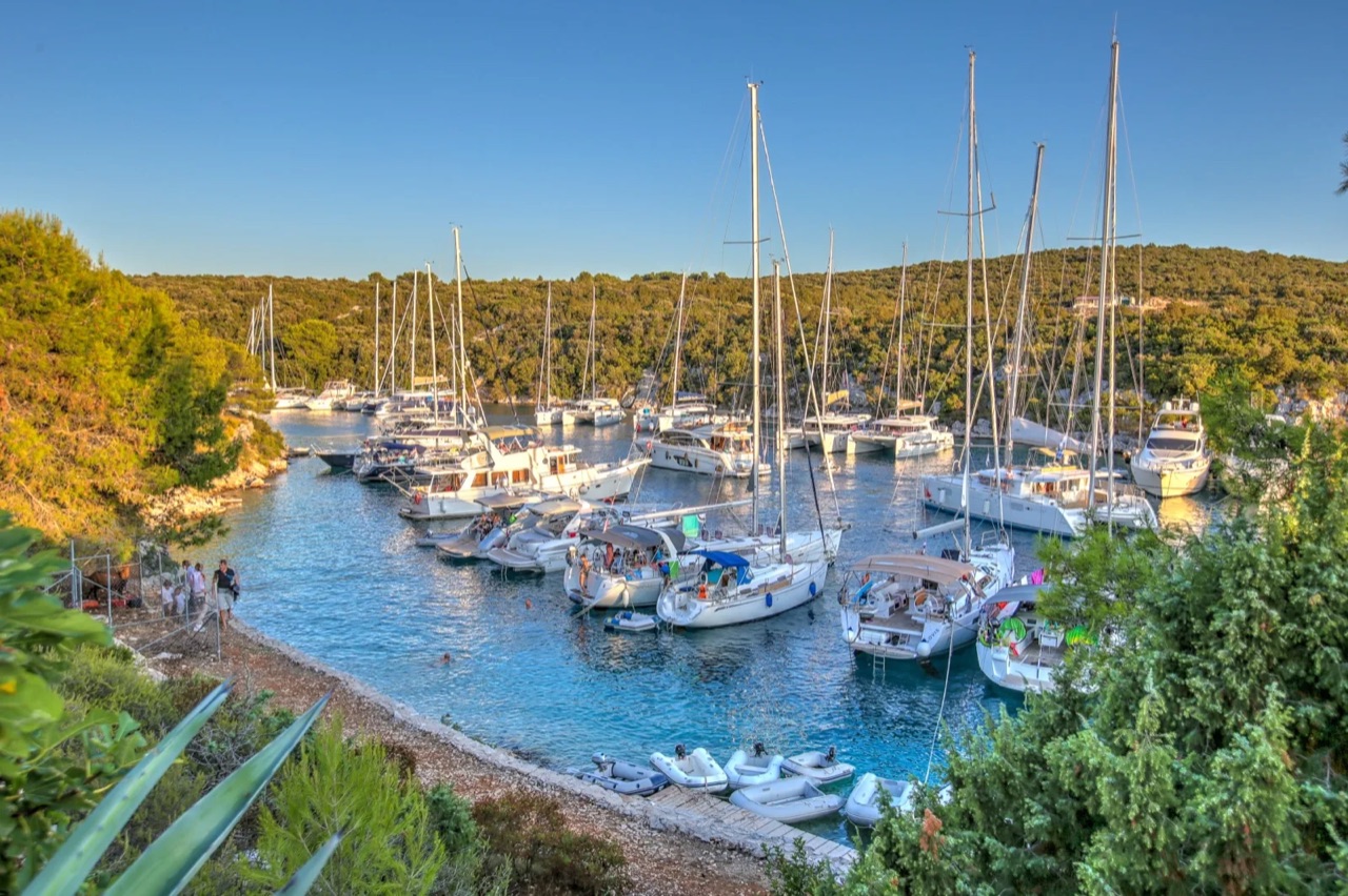 Sheltered Adriatic cove anchorage near Dubrovnik with clear turquoise water