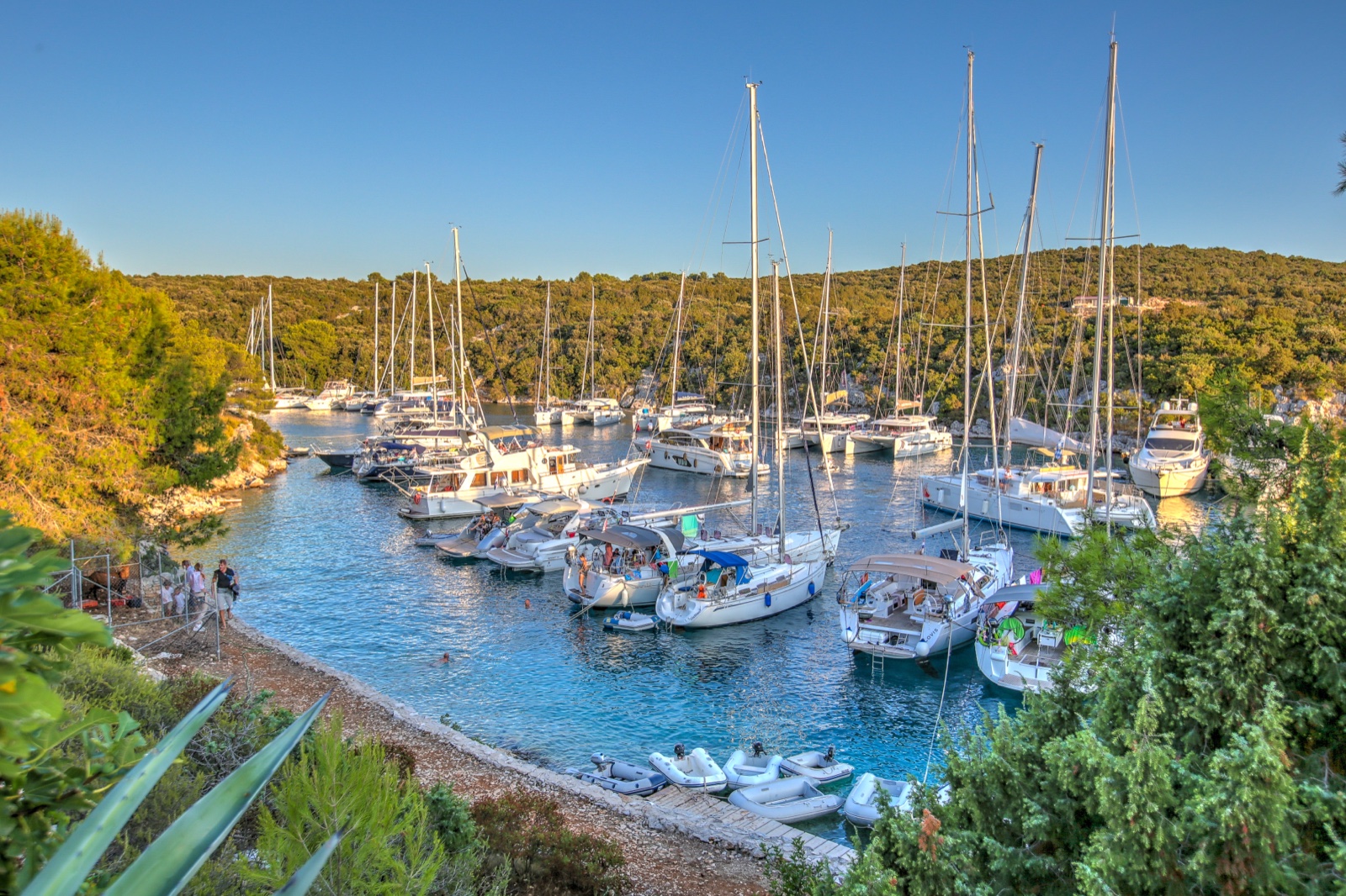 Sheltered Adriatic cove anchorage near Dubrovnik with clear turquoise water
