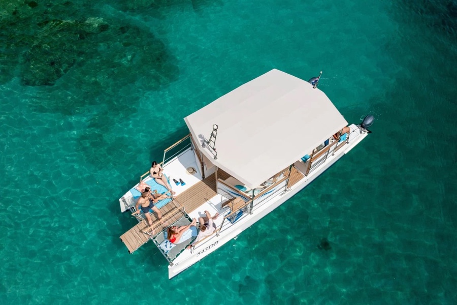 Catamaran X, the skippered charter catamaran for twelve guests, near Dubrovnik
